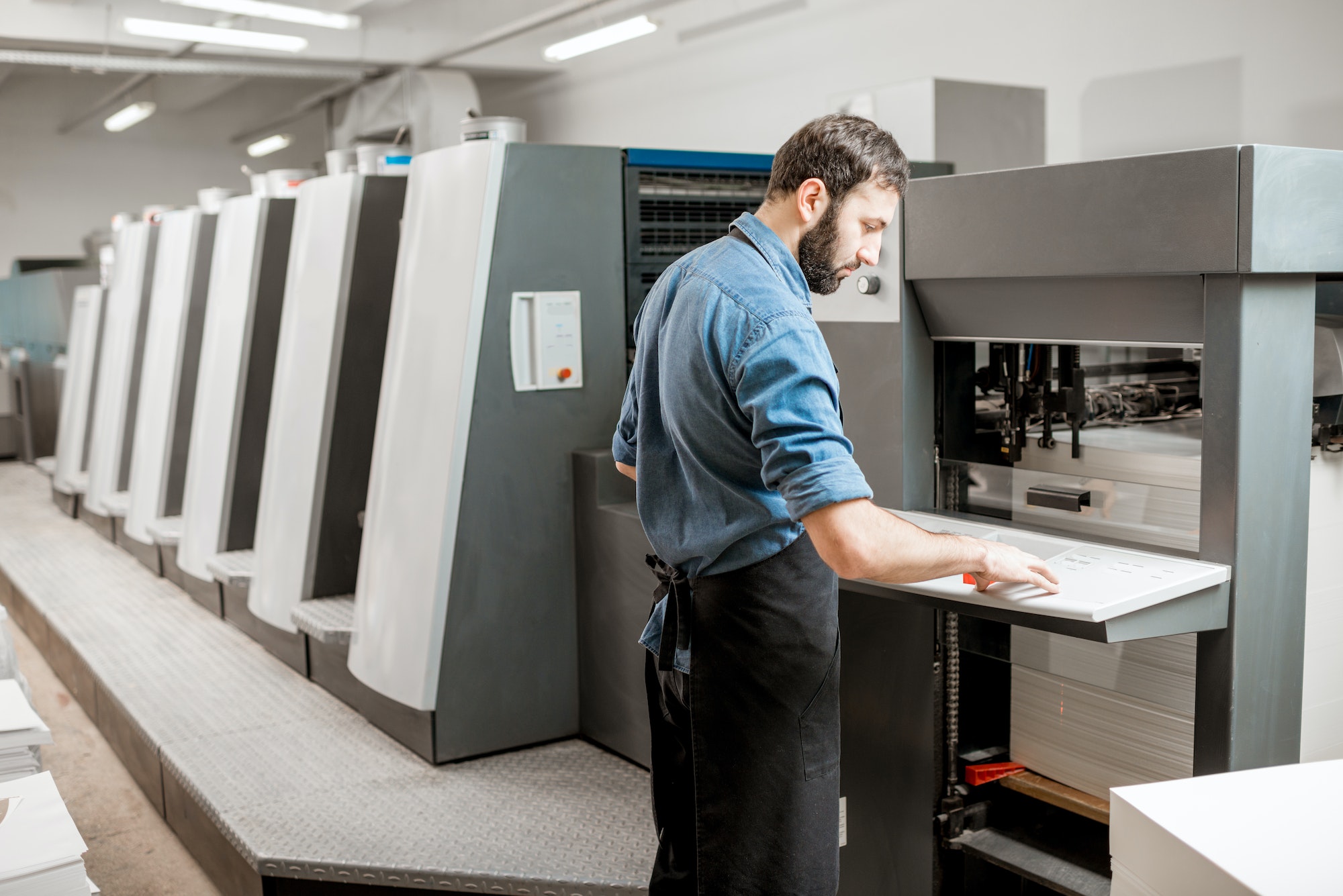 Printing operator working at the manufacturing